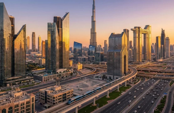 Dubai skyline at sunset highlighting the connectivity between major business districts like Business Bay and DIFC.