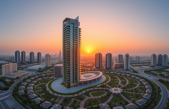 Skyline view of Jumeirah Village Circle featuring FIVE JVC tower at sunset.